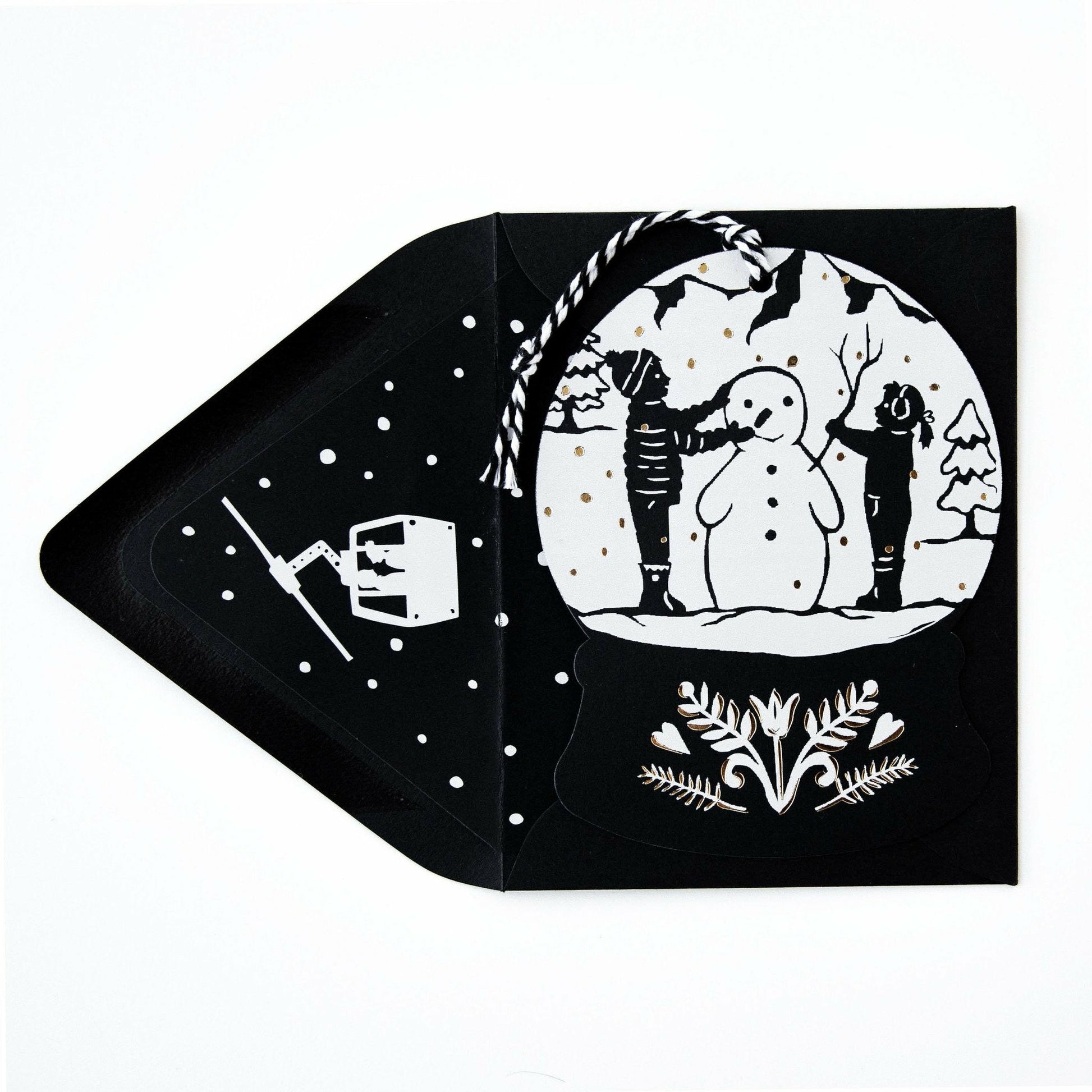Snowglobe-Shaped Papercut Christmas Card and Envelope with Snowman - The First Snow